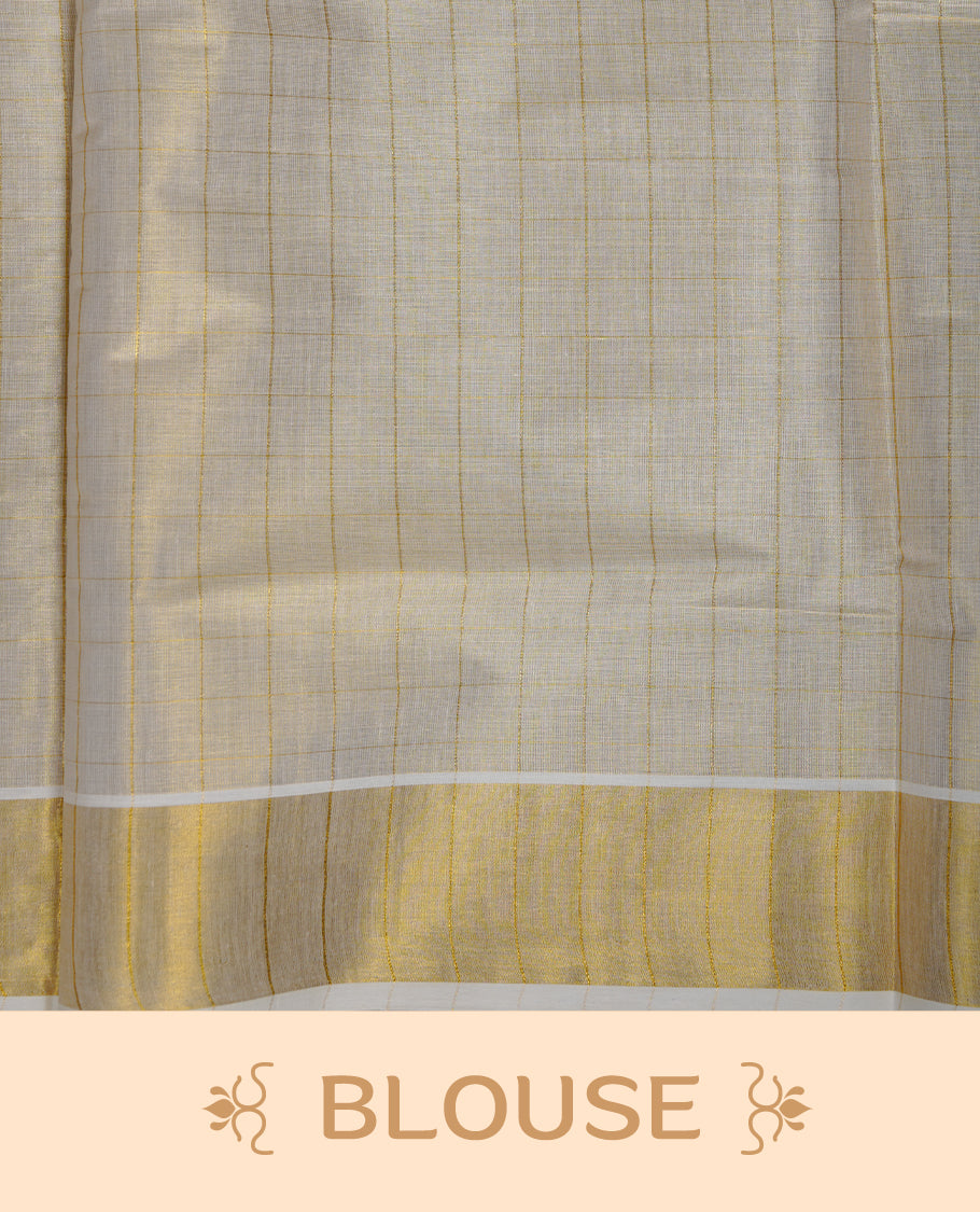 Off-white colour tissue Kerala saree with subtle gold checks across the body, finished with a traditional striped gold kasavu border and delicate tassel detailing on the pallu, paired with a matching blouse.