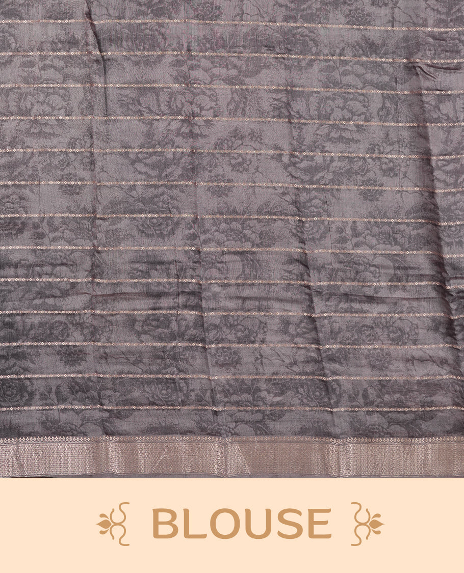 Black colour chanderi silk saree with gold zari strip pattern On body, compilmented by self colour border with antique zari pattern & white animal print pattern and a matching blouse.