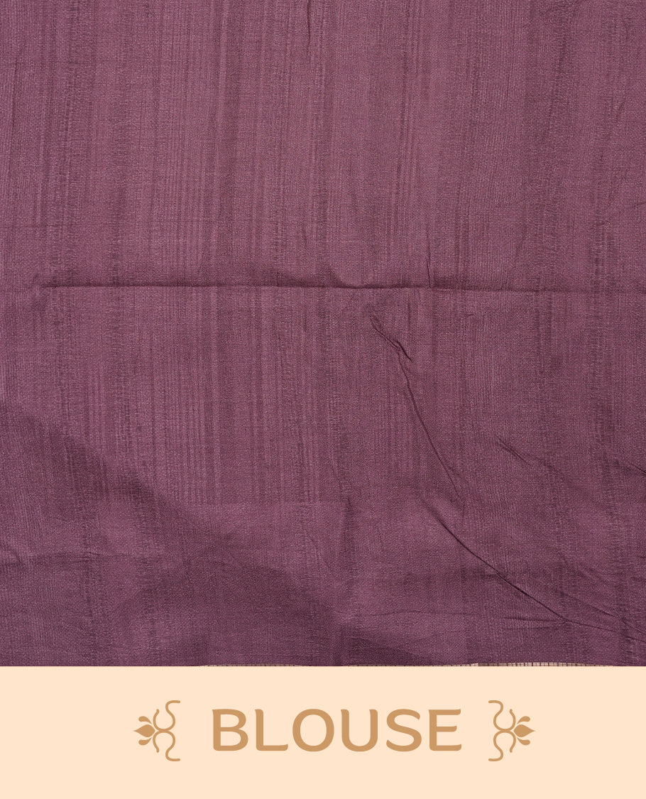 Purple colour semi tusser silk saree featuring Gold zari check pattern across body, faded contrast cream colour border with elephant print and paired with matching blouse.