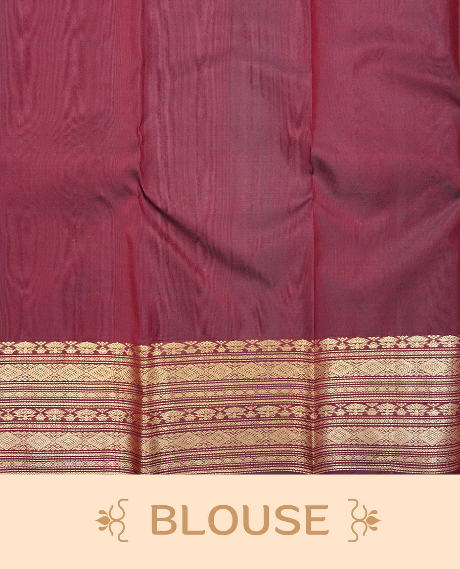 Chocolate Colour Pure Wedding silk saree featuring Gold zari Floral kodi pattern worked body, complemented by self colour with traditional border, comes with matching blouse piece.