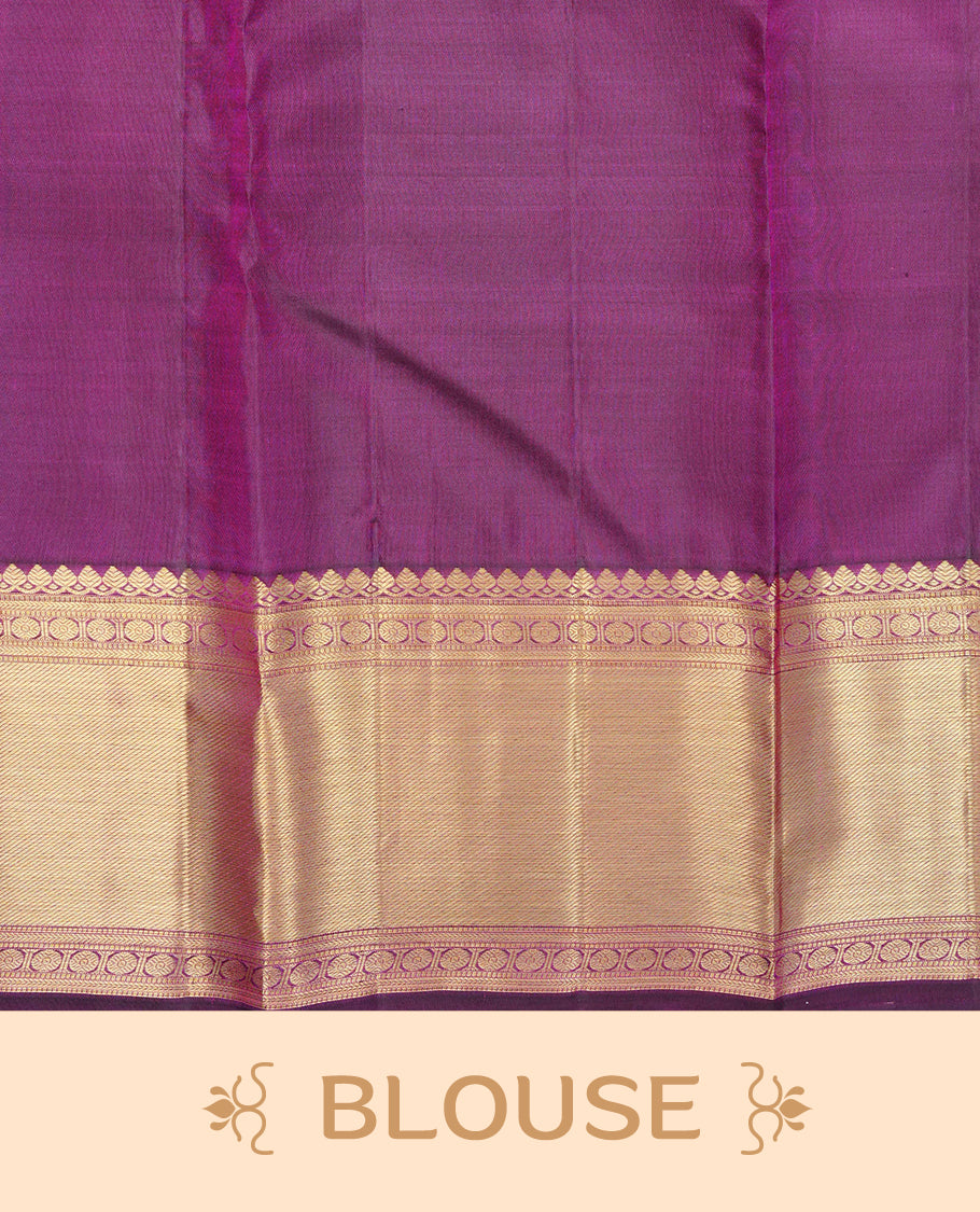 Deep purple colour pure wedding silk saree featuring gold zari designed box pattern on body, complemented by self colour with traditional border, comes with matching blouse piece.