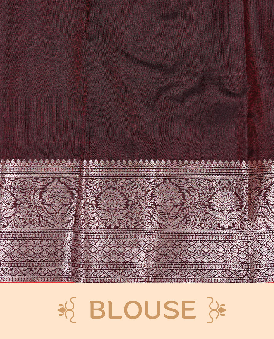 Dark chocolate colour semi wedding silk saree featuring Rose Gold zari Floral kodi pattern with Silver zari peacock motifs on body, complemented Rose gold zari border, paired with matching blouse piece.