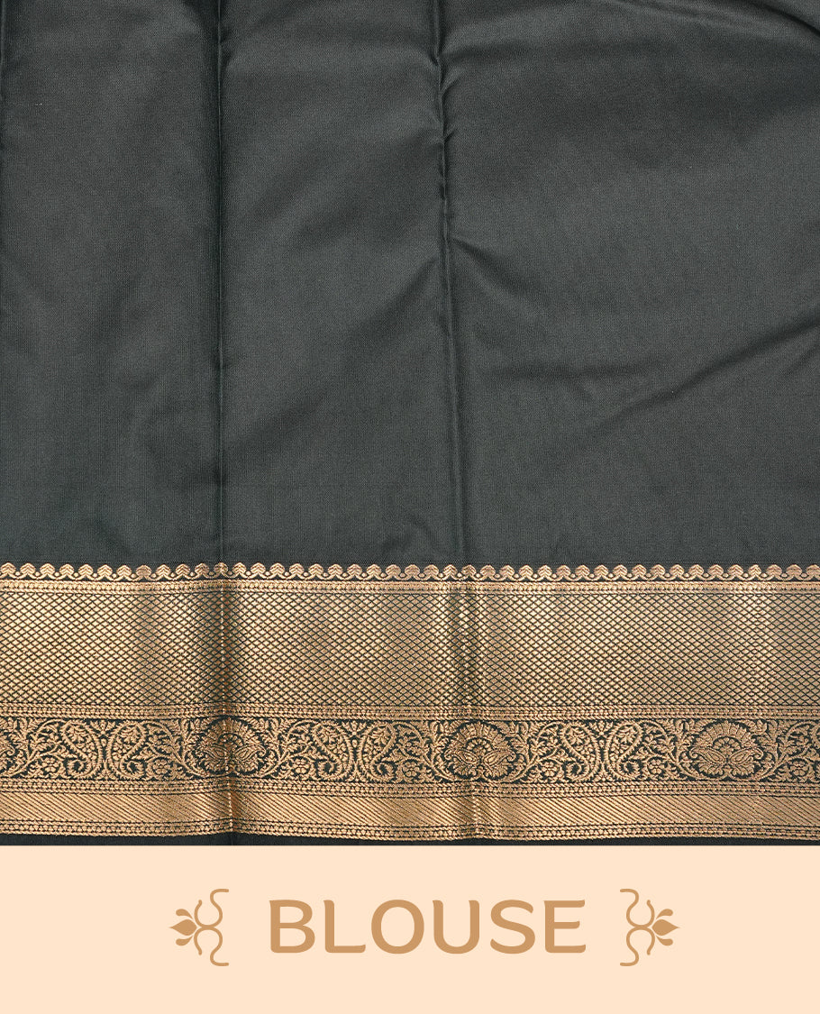 Orange colour semi Wedding silk saree featuring Gold zari motifs on body, enhanced with Contrast Green colour with traditional border, paired with matching blouse piece.