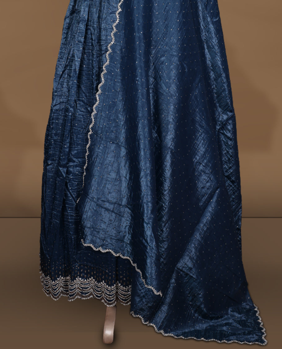 Midnight blue colour stitched gown set with sleeveless embroidered yoke, flared ankle‑length silhouette, and attached dupatta featuring dainty butti work and scalloped beaded edging.