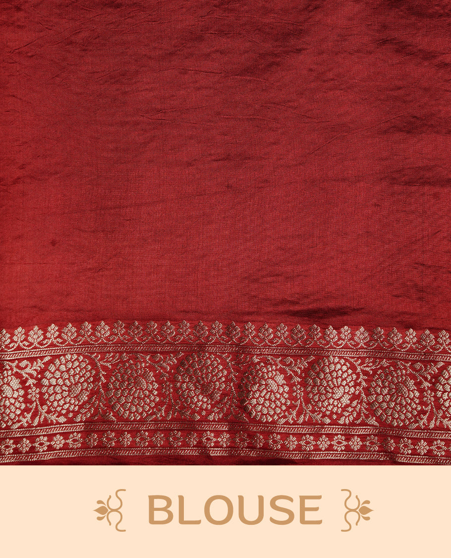 Red colour banaras crepe saree featuring gold & silver zari design stripes on body, complemented by self colour border, paired with matching blouse piece.