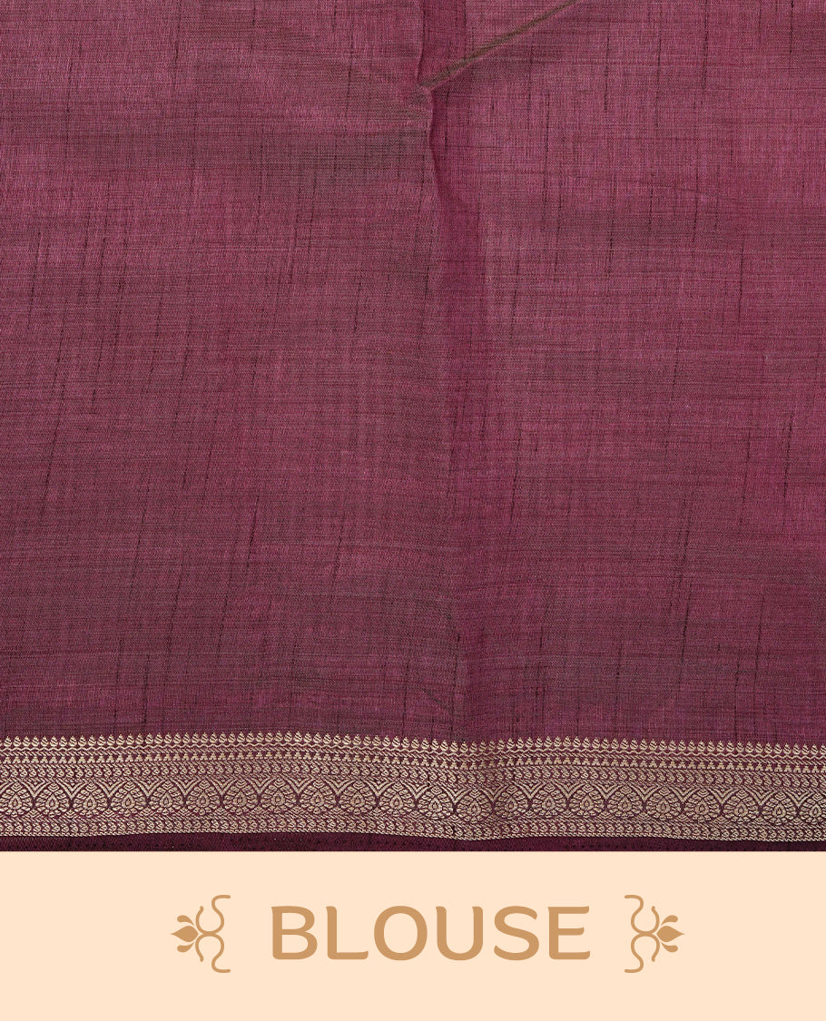 Cream colour Semi Tussar silk saree featuring an elegant plain body, accentuated by a contrast Purple border adorned with intricate gold zari work, paired with a matching blouse piece.