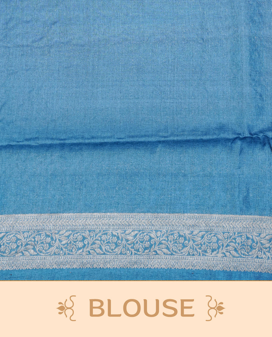 Teal Blue  colour Pure tusser silk saree featuring Silver  Zari floral Kodi Work On Body , A Plain  border & Grand  pallu ,Paired With  a matching blouse piece.
