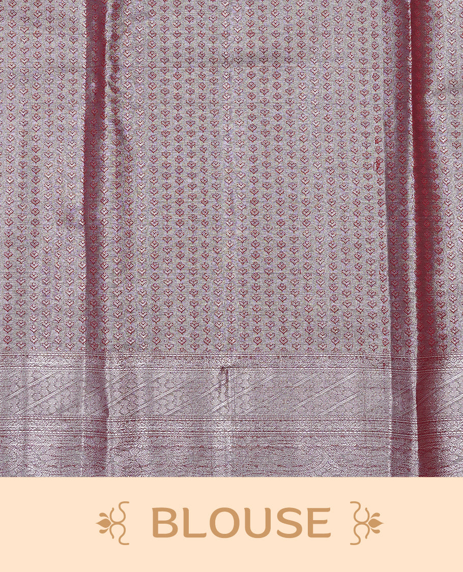 Silver & Maroon colour Tissue silk saree featuring Maroon & Silver zari kodi pattern on body, enhanced with Zari border on self colour, paired with matching Blouse piece.