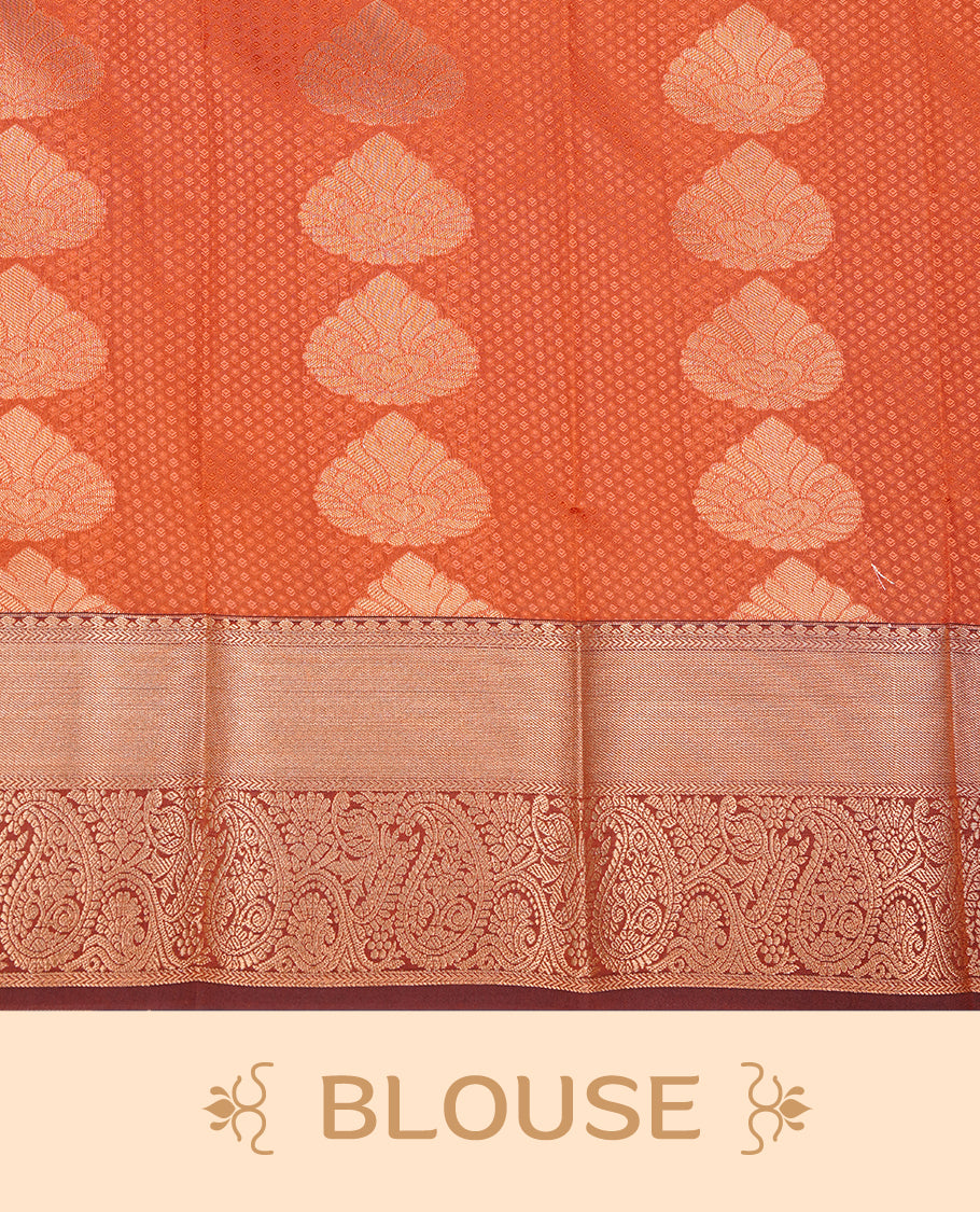 Rust orange colour Semi silk saree Featuring gold zari motifs on body, complemented by contrast brown colour with gold zari border, paired with matching blouse piece.