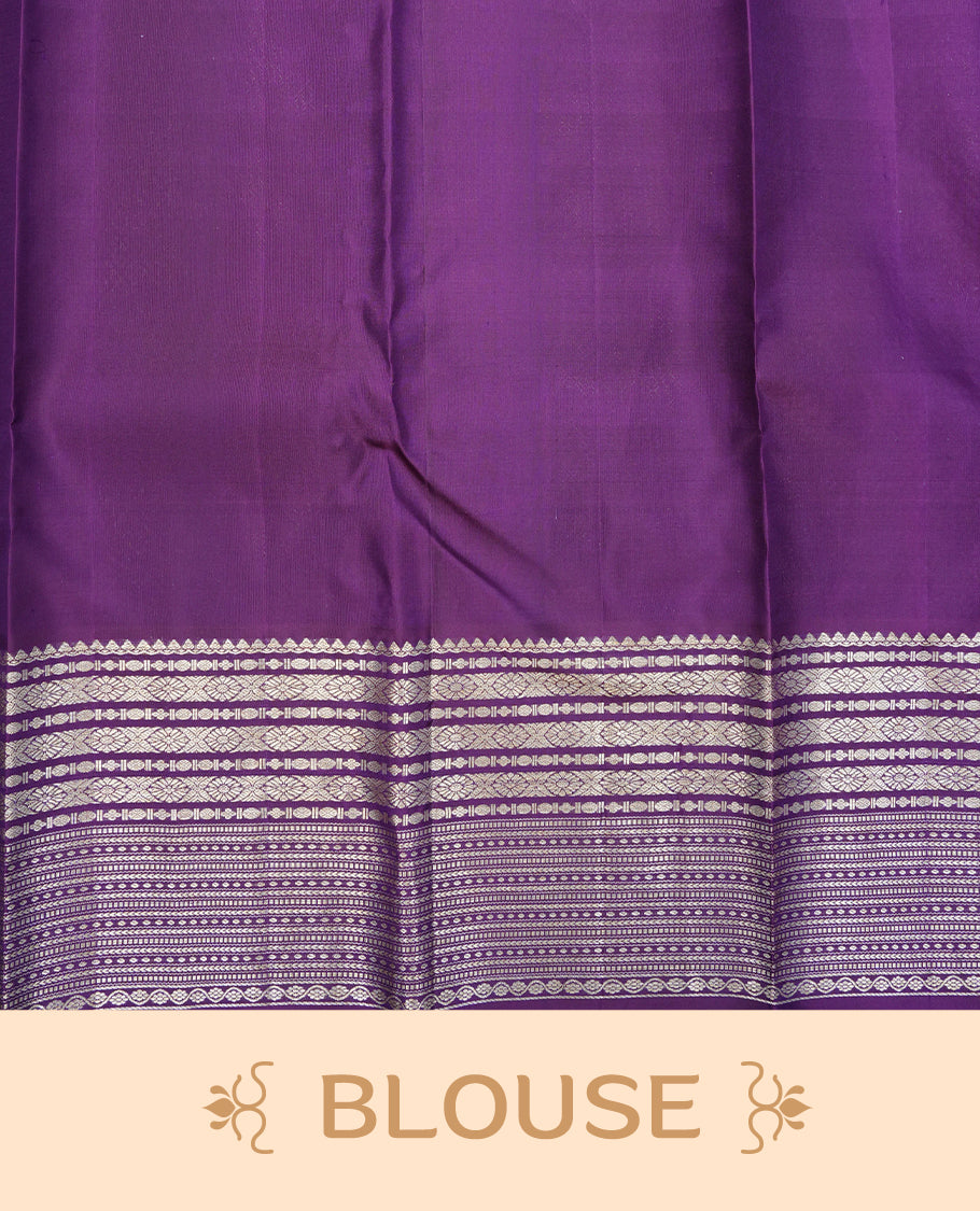 Purple colour Pure wedding silk saree featuring dotted Designed pattern on body, complemented by self colour with traditional border, comes with matching blouse piece.