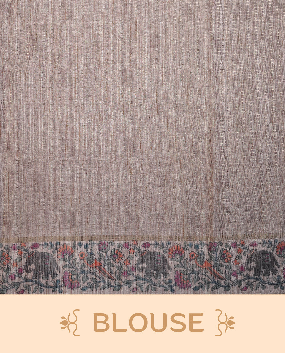 Charcoal black colour tussar saree featuring golden zari dot stripped pattern on the body, complemented by a contrast cream colour mutlicolour floral kodi & animal print on border & pallu, paired with a matching blouse.