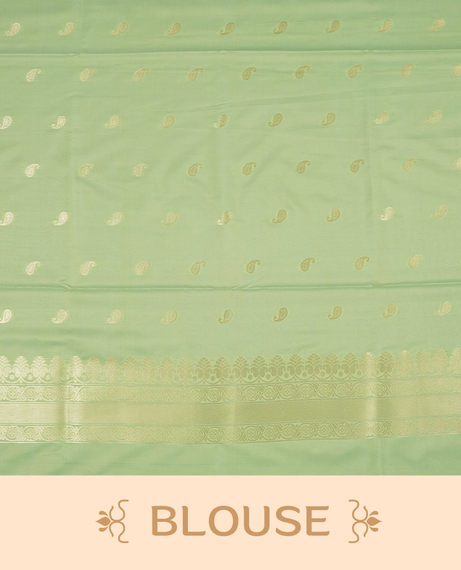 Light Green colour semi soft silk saree featuring an all-over woven leaf pattern in gold colour, finished with a matching border adorned with detailed paisley and floral motifs, and a matching blouse piece.
