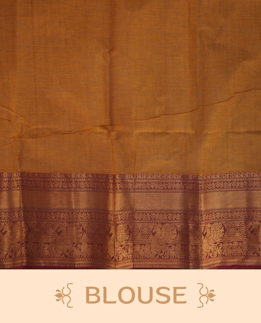 Mustard colour chettinad saree featuring gold zari stripes on body, complemented by contrast Maroon colour with traditional border, paired with matching blouse piece.