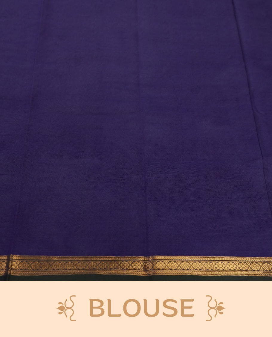 Purple colour pure Kanchi cotton saree embellished with delicate golden buttas and a graceful zari deer motif, paired with an intricately woven gold border, radiating elegance and tradition & Comes with matching blouse.