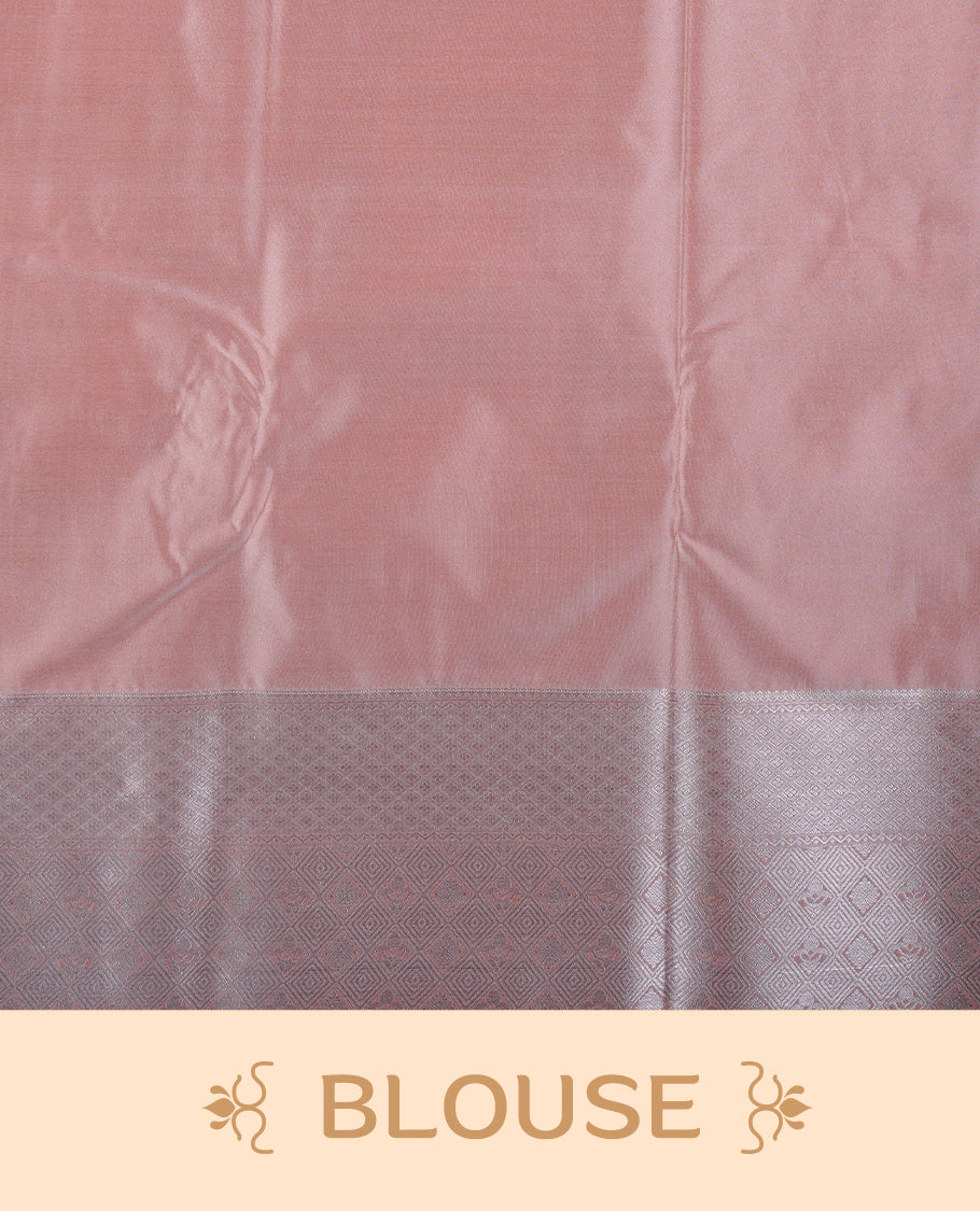Peach & cream colour semi soft silk saree featuring a silver zari patterned body, complemented by silver zari motifes on pallu & border and a matching blouse piece.