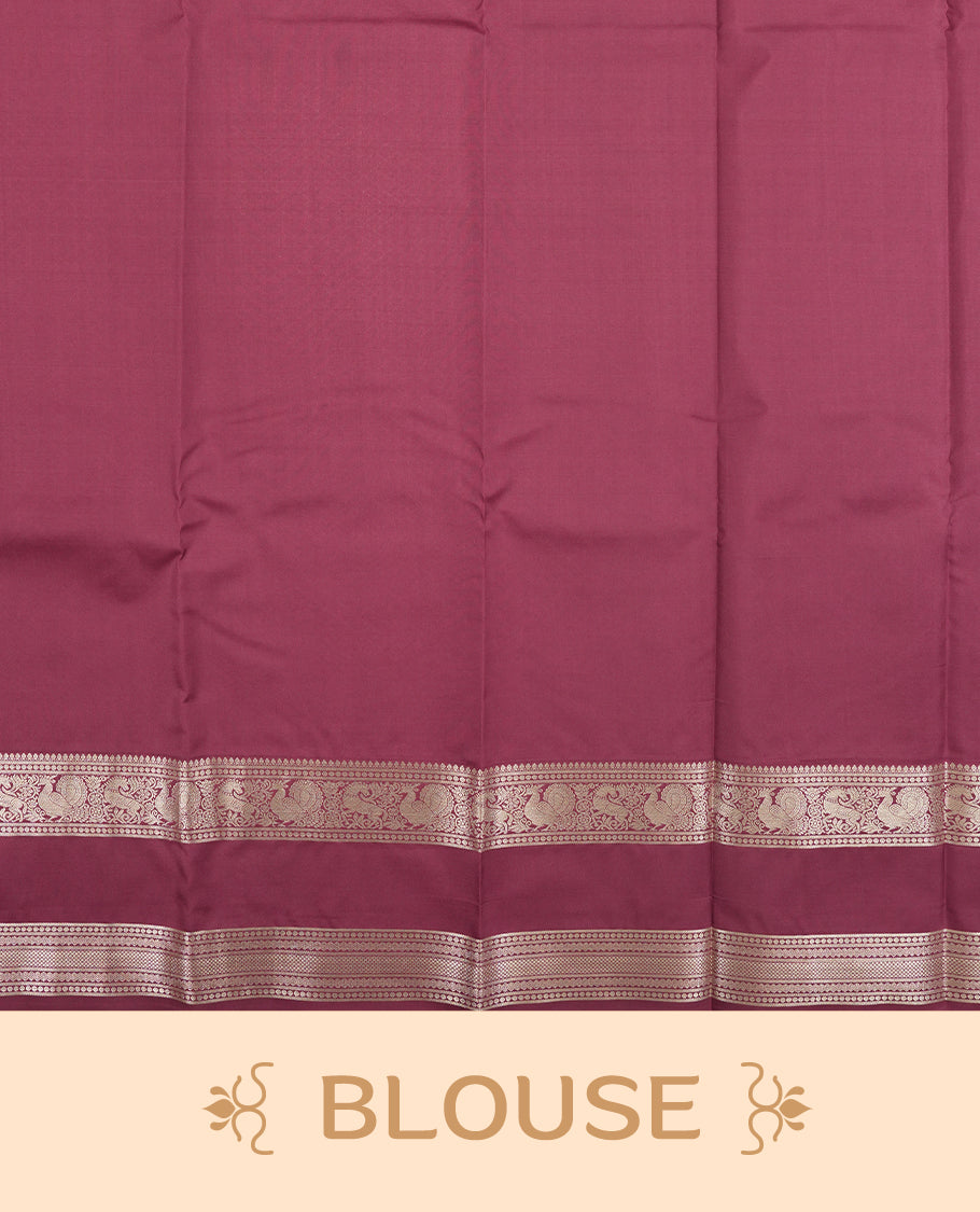 twilight lavender colour semi soft silk saree featuring a gold colour textured patterned body, complemented by self coloured golden motifes on pallu & border and a matching blouse piece.