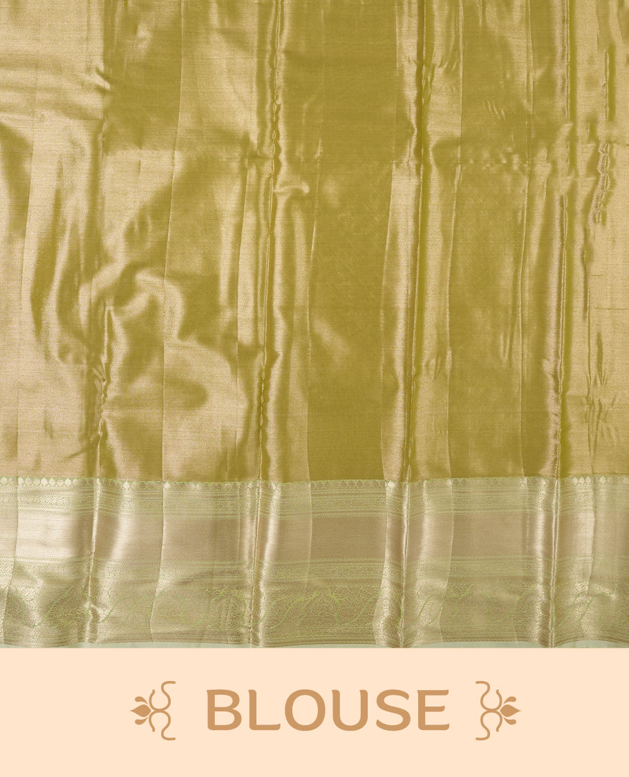 Golden green colour and rose gold Zari Tissue Brocade Saree features intricate floral Motifs on body and pastel green colour contrast  border with traditional border & pallu, paired with matching blouse