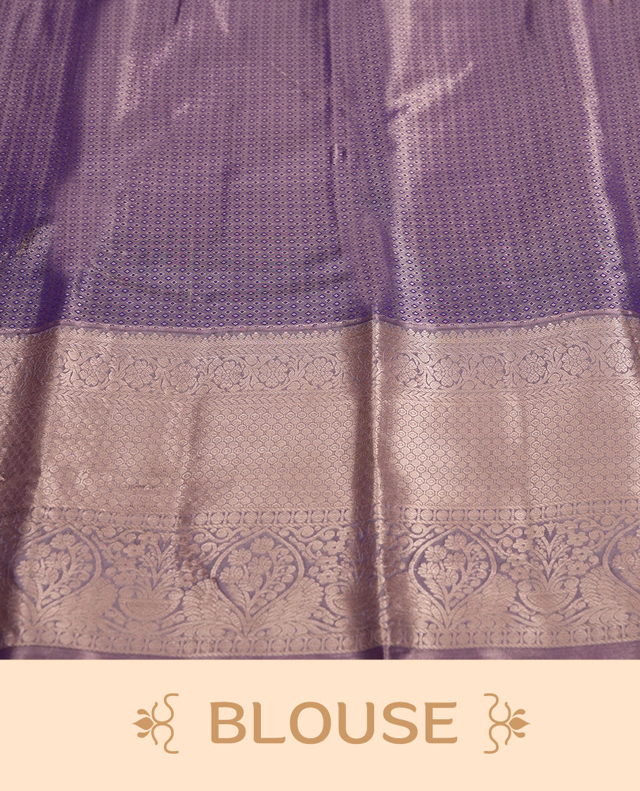 Purple colour and Antique silver Zari Tissue Brocade Saree features intricate Motifs on body and traditional border & pallu with floral patterns, paired with matching blouse
