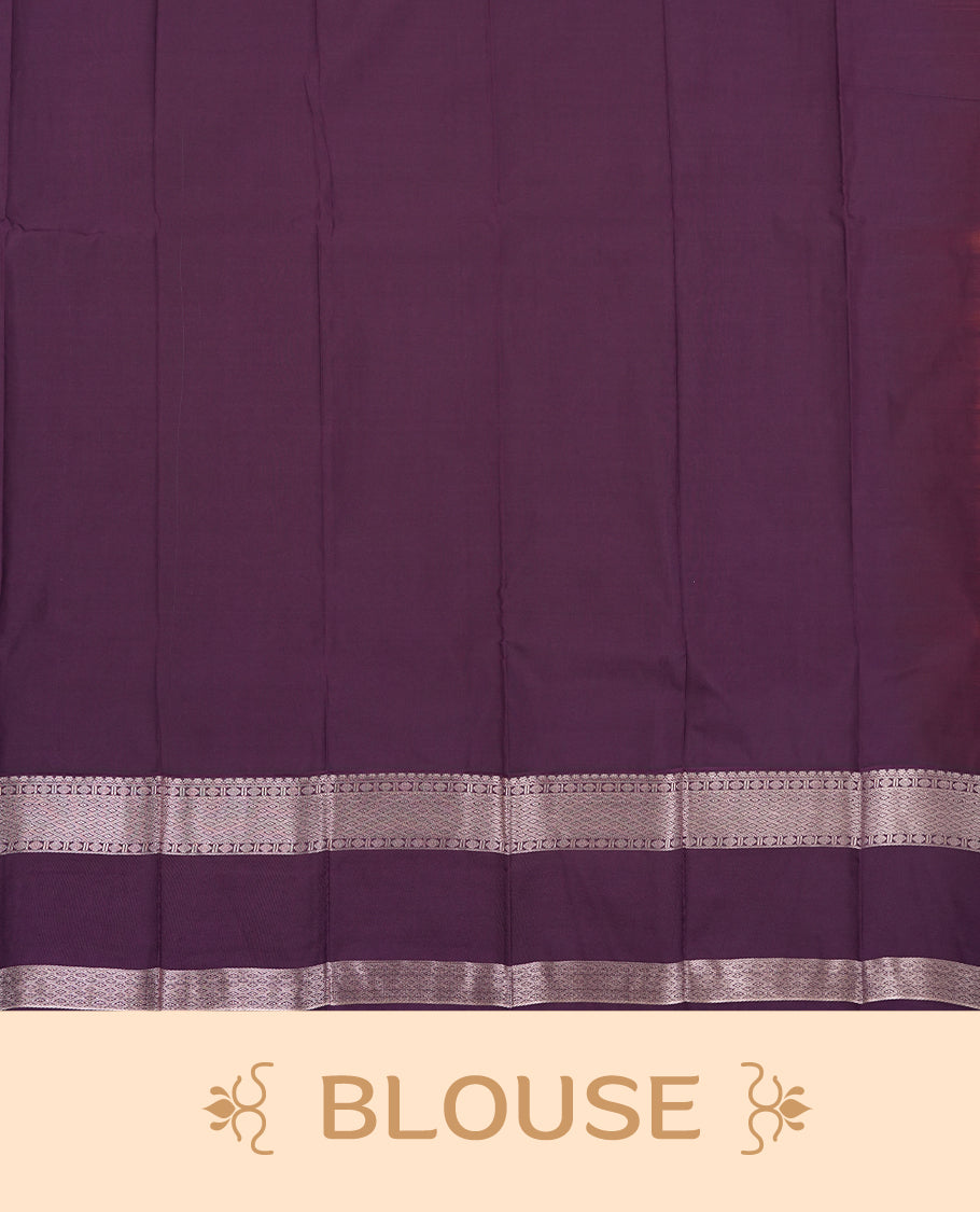 Orange red colour Semi Silk Saree with gold zari striped patterns on the body, paired with a contrasting Dark violet colour traditional pallu and border, and a matching blouse piece.