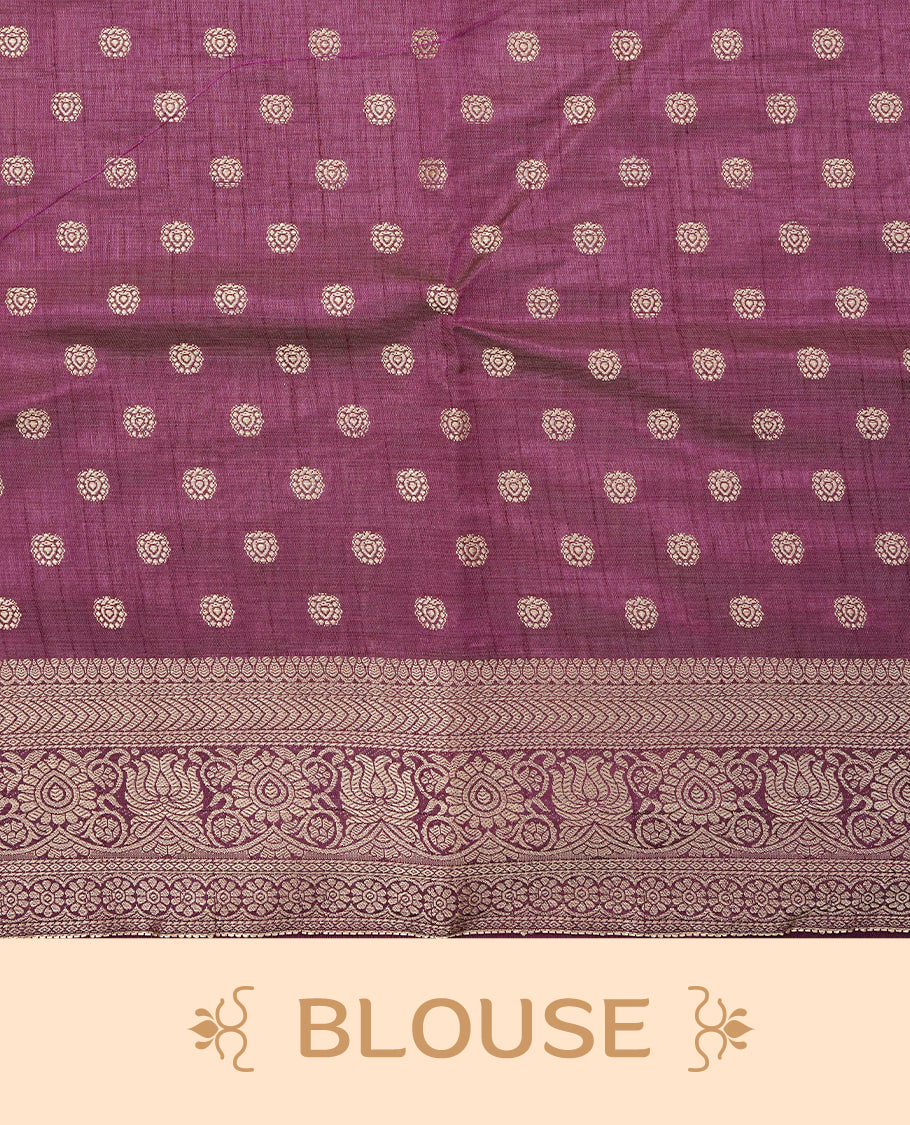 Light Gold Tussar saree featuring Gold zari buttas on body, complemented by contrast Purple Colour with Gold zari border, comes with matching blouse piece.