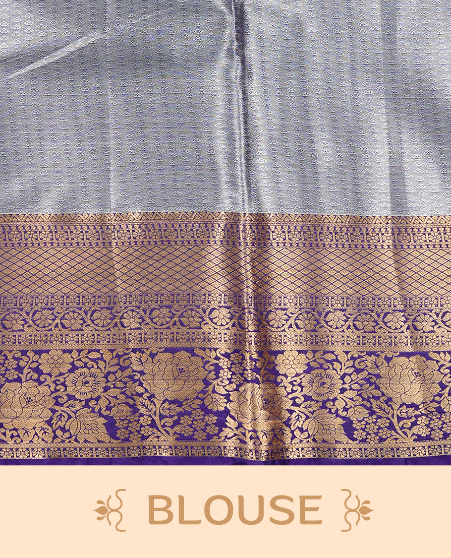 Aqua green colour and antique gold Zari Tissue Brocade Saree features intricate floral Motifs on body and rich Violet colour with traditioal Border & pallu with Gold Zari Patterns paired with matching blouse