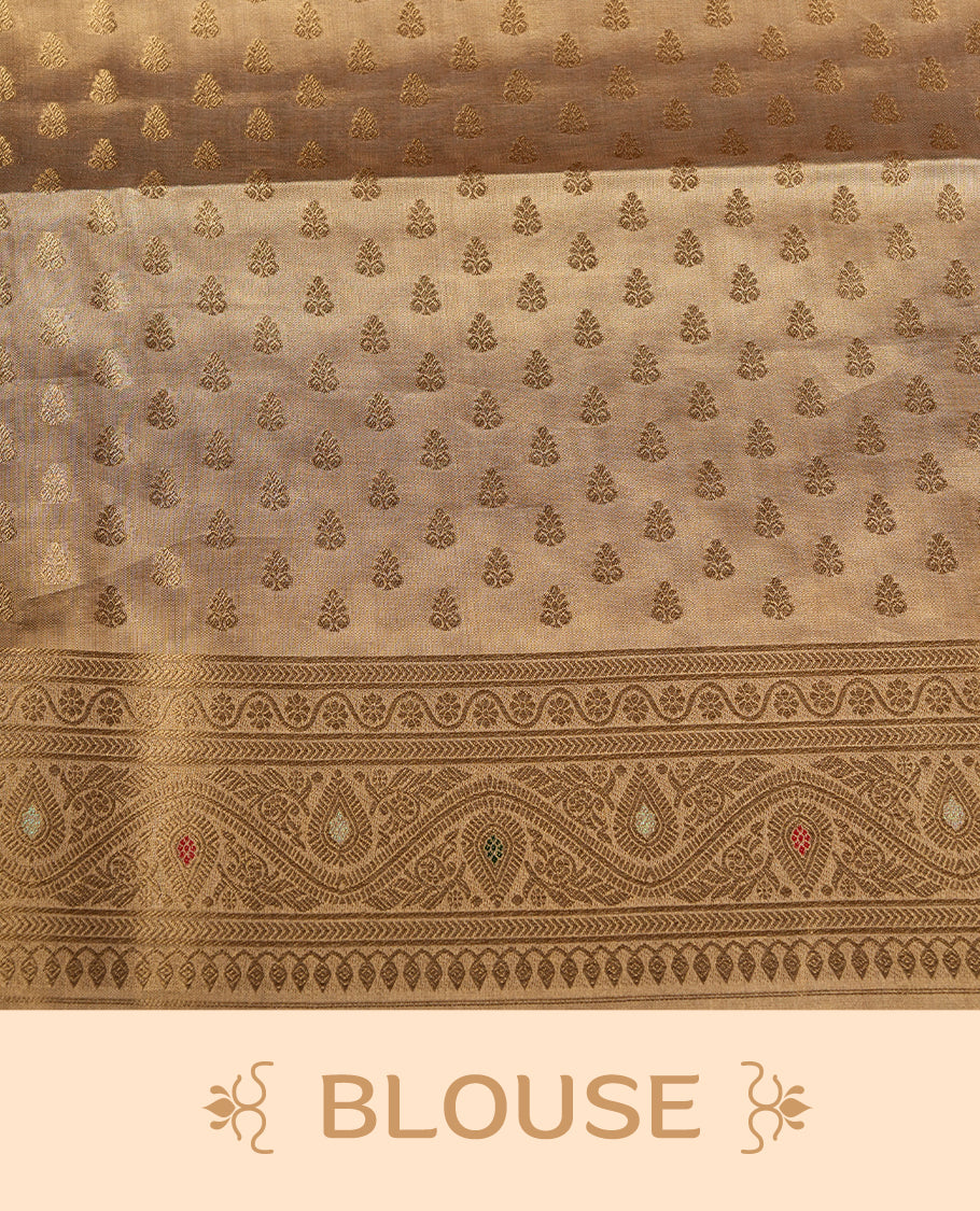 Light Gold colour tissue banaras silk saree featuring antique gold zari motifs on the body with rich traditional zari border and pallu, paired with a matching blouse piece.