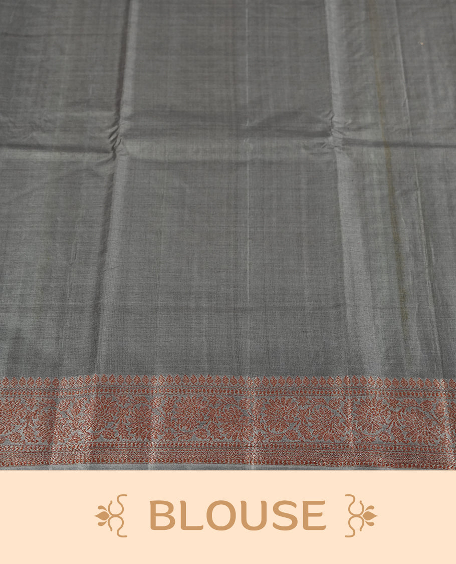 Mauve colour Pure Banarasi Tussar Saree , featuring intricate zari motifs, contrast grey colour traditional border, woven pallu, and matching blouse.