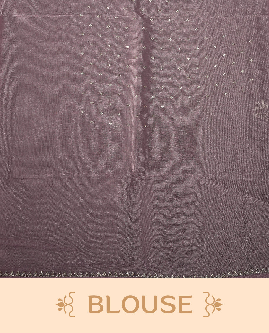 Light Purple Colour net shimmer fancy saree adorned with white stone buttas all over the body, paired with a delicate stone worked border and matching blouse