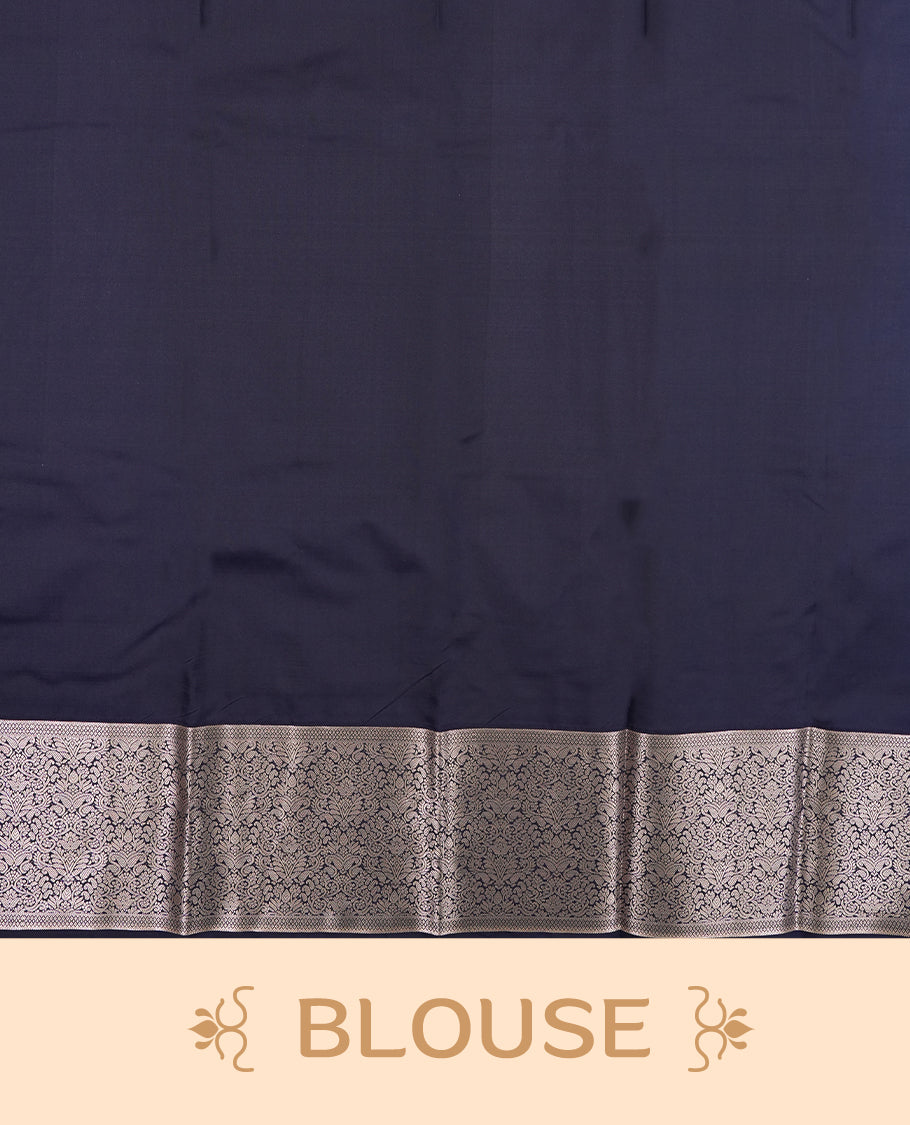 Jade green colour semi soft silk saree featuring a golden textured patterned body, complemented by contrast navy blue with silver zari motifes on pallu & border and a matching blouse piece.