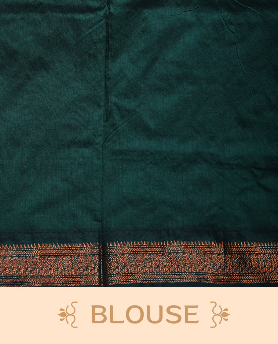 Rust orange colour Kalyani cotton saree featuring a plain elegant body, complemented by a rich dark green zari border and traditional woven pallu, paired with a matching blouse.
