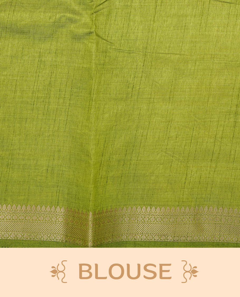 Light gold Colour Tussar saree featuring elegant plain body, complemented by contrast Light green colour with zari work border, comes with matching blouse piece.