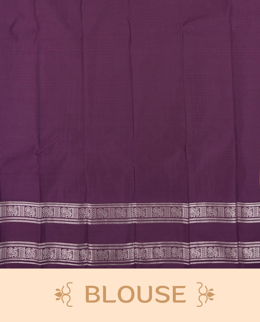 Olive yellow colour Semi Silk Saree with silver zari patterns on the body with self coloured border, paired with a contrasting Dark violet colour traditional pallu, and a matching blouse piece.