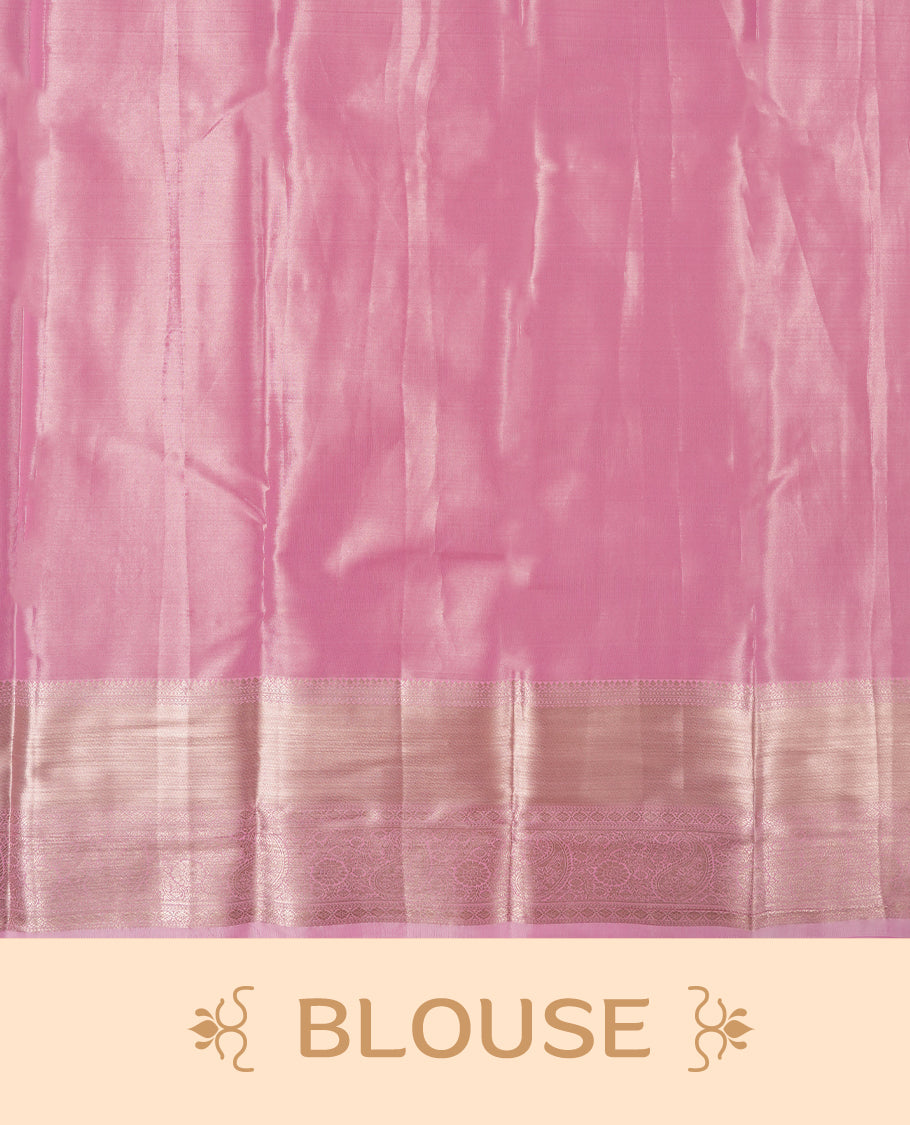 Taffy pink colour and silver Zari Tissue Brocade Saree features intricate floral Motifs on body and self coloured with gold traditional border & pallu, paired with matching blouse