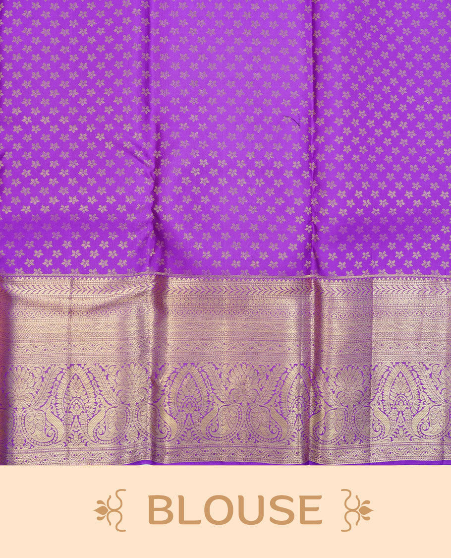 Violet colour pure wedding silk saree featuring silver & gold zari Designed pattern on body, complemented by self colour with traditional border, comes with matching blouse piece.
