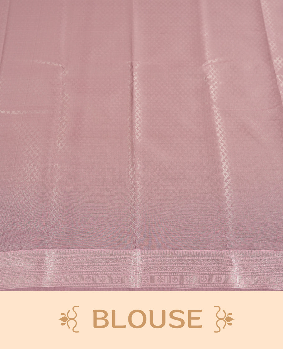 Navy blue colour semi silk saree adorned with subtle silver zari motifs on the body, complemented by contrasted a pastel light pink pallu intricately  woven with rich floral patterns border and pallu, and paired with a matching blouse