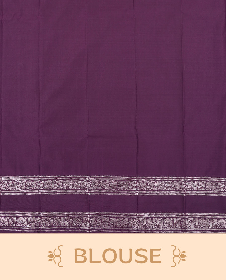 Rani pink colour Semi Silk Saree with silver zari patterns on the body, paired with a contrasting dark purple colour traditional pallu and border, and a matching blouse piece.