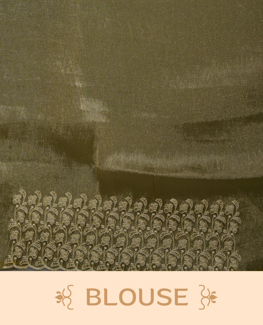 Pastel olive colour organza saree featuring white thread embroidery motifs on body and  thread detailing on the border and paired matching blouse.