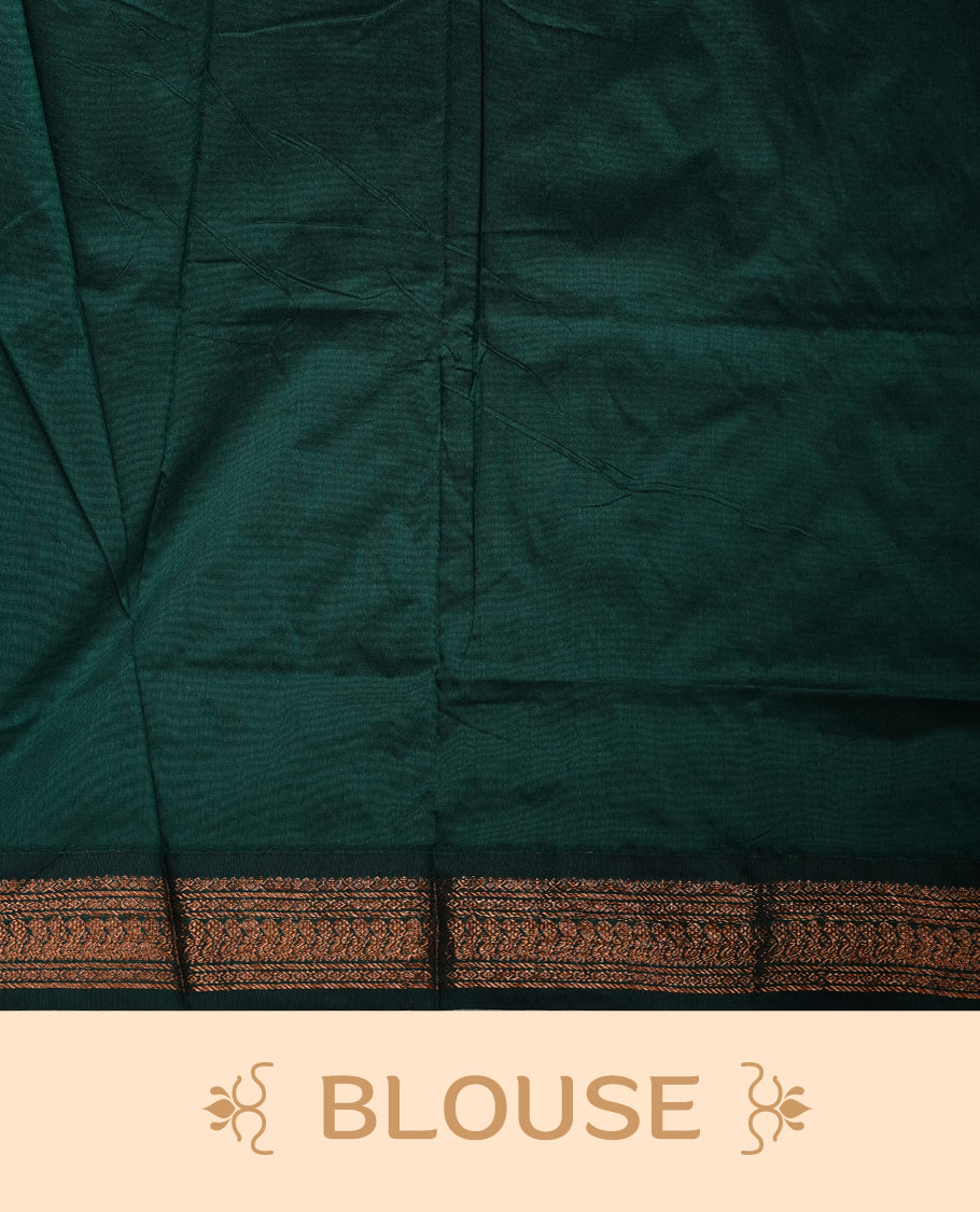 Rust orange colour Kalyani cotton saree featuring a plain elegant body, complemented by a rich green zari border and traditional woven pallu, paired with a matching blouse.