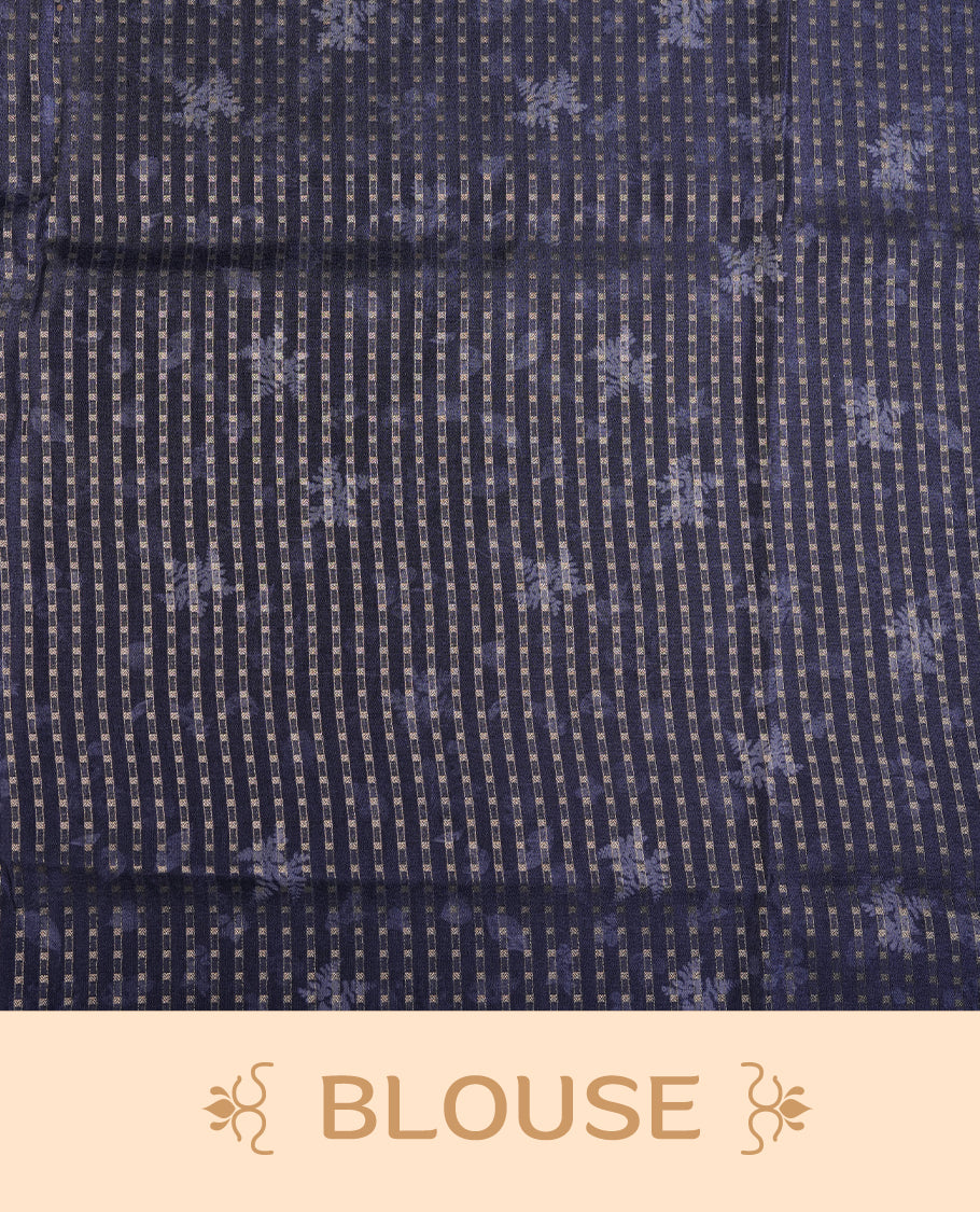 Dark blue colour tussar saree featuring woven Eco leaves printed on the body, complemented by a self colour gold zari bindi butta border & pallu, paired with a matching blouse.