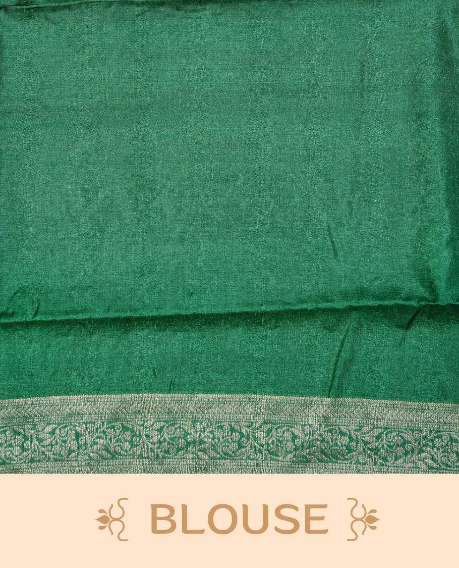 Green  colour pure tussar silk saree featuring light gold zari floral kodi work on the body, a plain border, grand pallu, Paired With  a matching blouse piece.