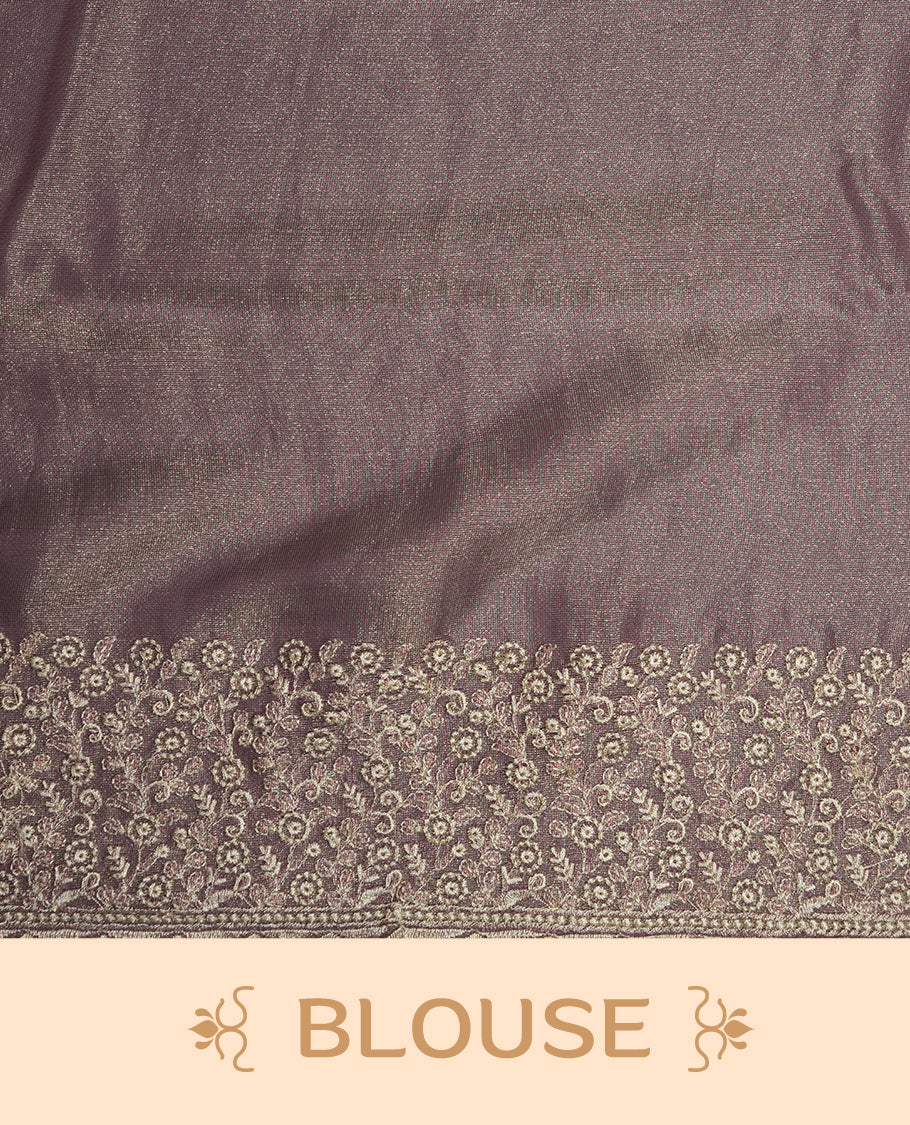 Pastel Lavender colour net organza saree featuring white thread embroidery motifs on body and  thread detailing on the border and paired matching blouse.