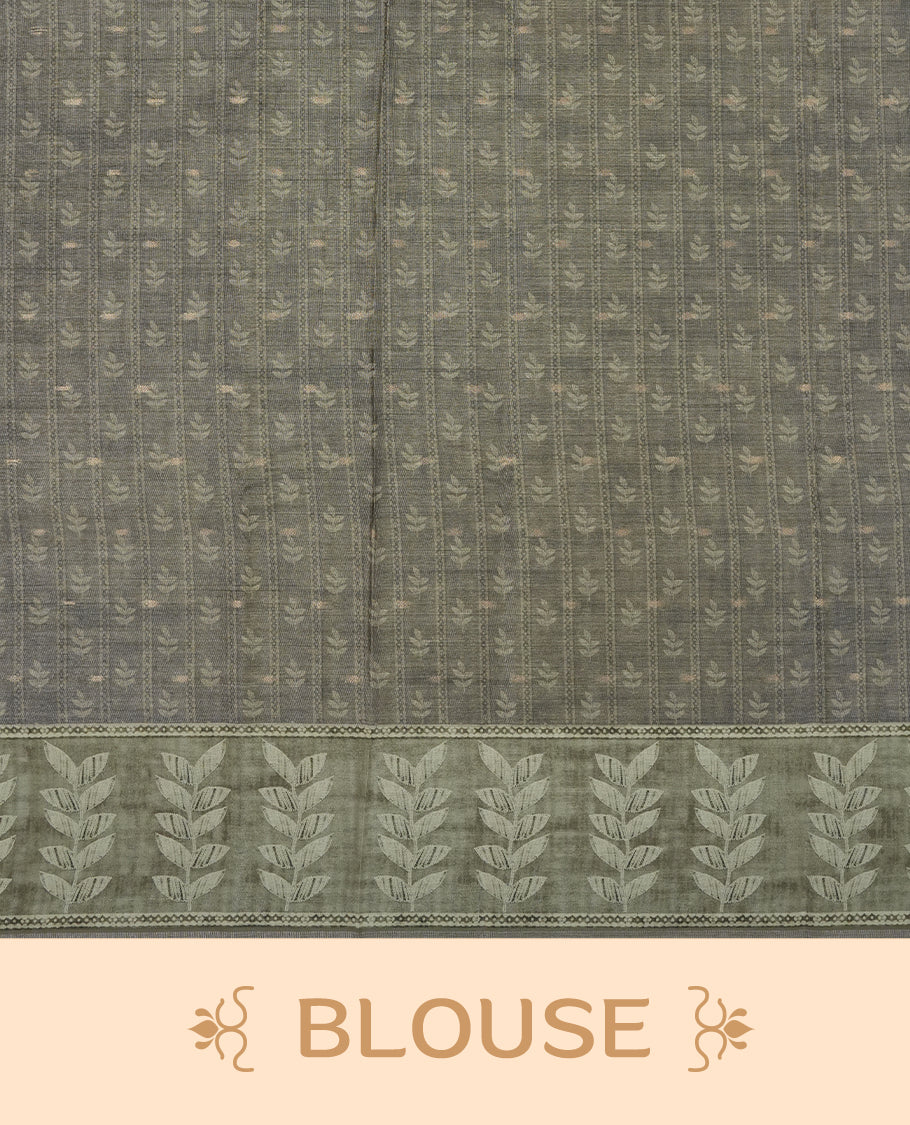 Olive sage colour semi tussar saree adorned with Cream Zigzag printed pattern across the body and Leaf pattern on contrast olive sage colour border, paired with a matching blouse.