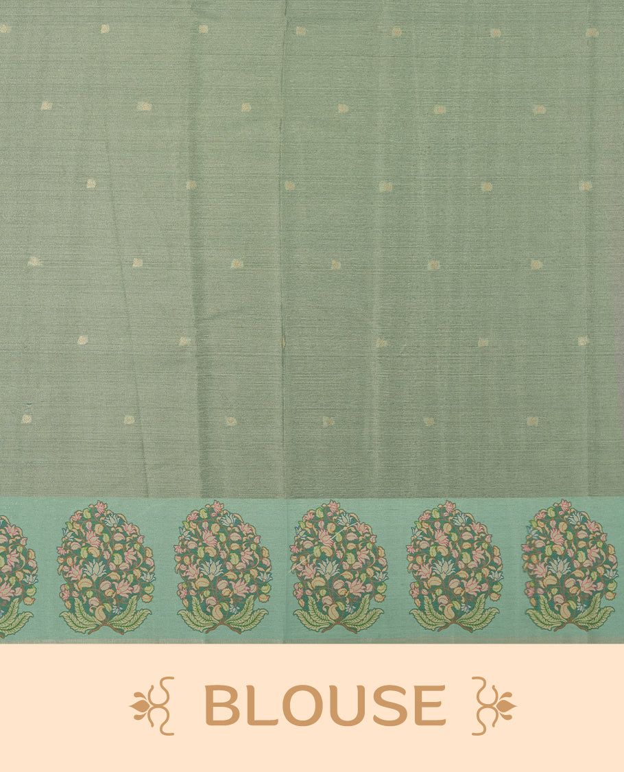 Silver colour semi tussar saree adorned with gold zari motifs across the body and Floral pattern contrast Aqua green colour on border, paired with a matching blouse.