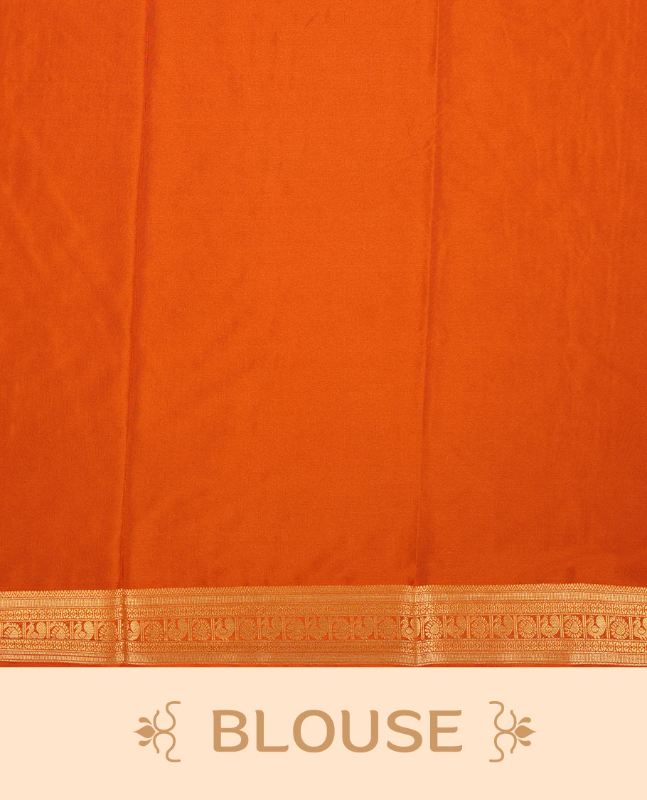 Dark Choclate colour mysore crepe saree with gold zari check pattern on body, complemented by contrast dark mustard colour border featuring peacock and chakkram motifs, paired with matching blouse.