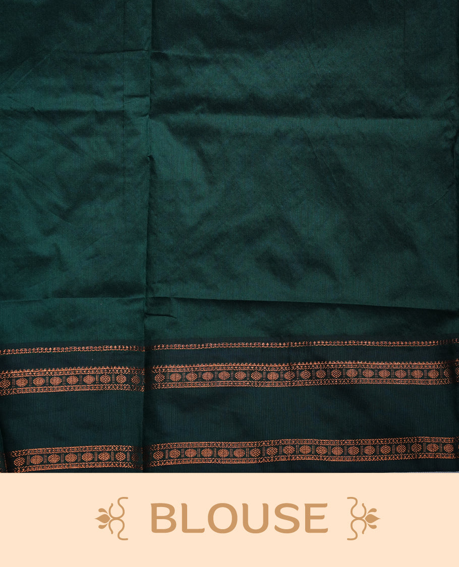 Purple colour mixed Kalyani cotton saree with subtle zari motifs, dark green zari border and rich traditional pallu, paired with a matching blouse.
