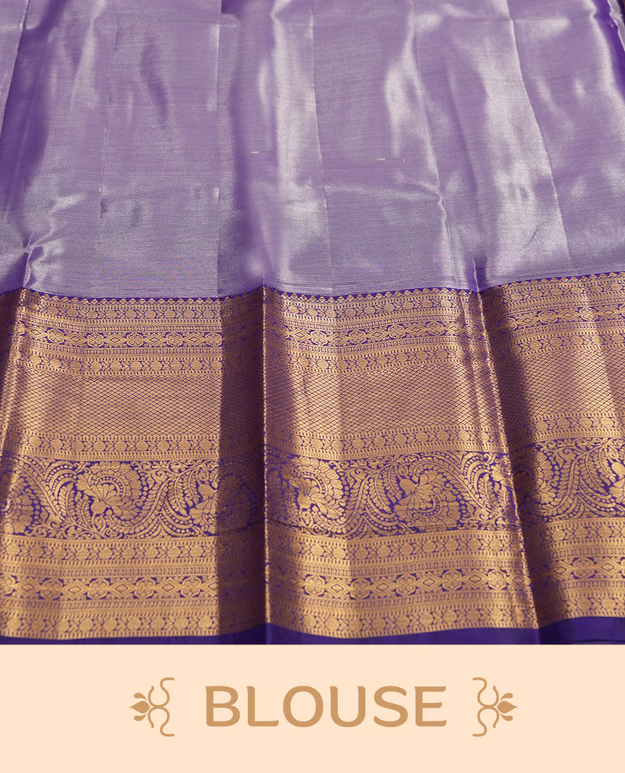 Pink colour and Antique gold Zari Tissue Brocade Saree features intricate blue colourred floral Motifs on body and a navy blue colour traditional border & pallu with floral patterns, paired with matching blouse