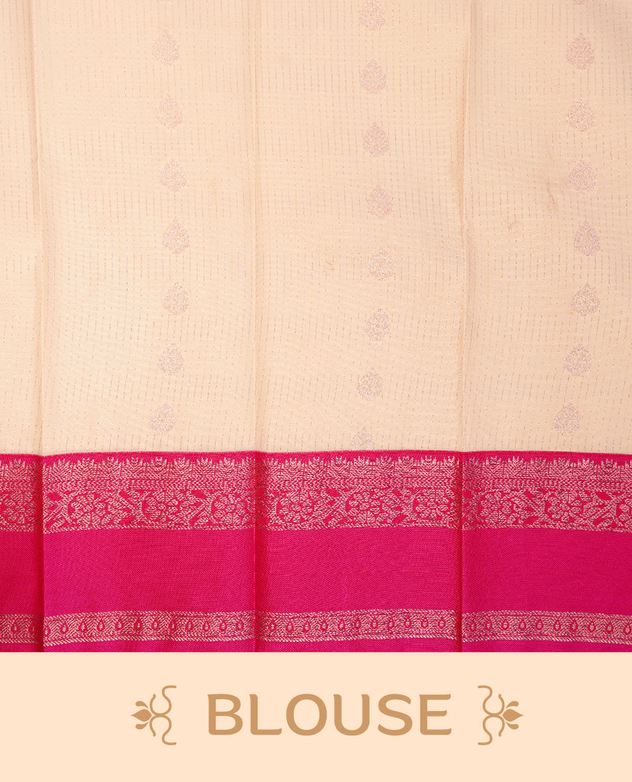 Cream coloured soft silk saree featuring gold zari stripes and motifs across the body, enhanced with a contrast Magenta border and pallu, paired with a matching contrast blouse piece.