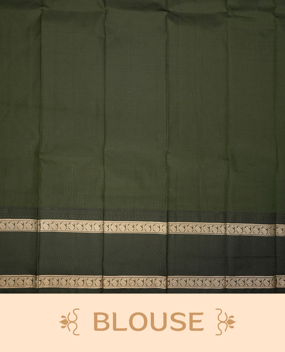 Cream coloured soft silk saree featuring gold zari stripes and motifs across the body, enhanced with a contrast Deep green border and pallu, paired with a matching contrast blouse piece