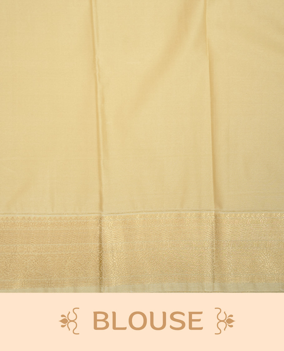 Orange coloured soft silk saree featuring gold zari motifs across the body, enhanced with a contrast Cream border and pallu, paired with a matching contrast blouse piece.