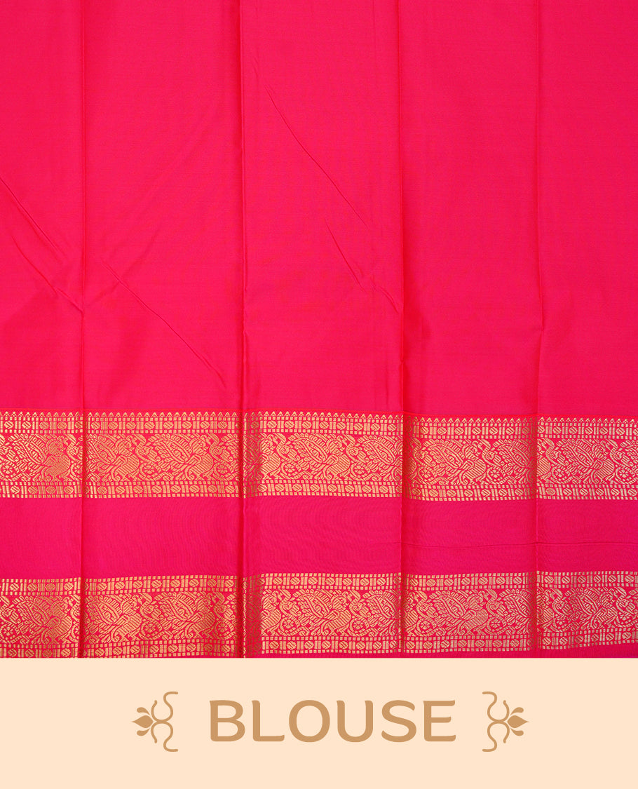 Dark Green coloured soft silk saree featuring gold zari stripes and motifs across the body, enhanced with a contrast Magenta border and pallu, paired with a matching contrast blouse piece